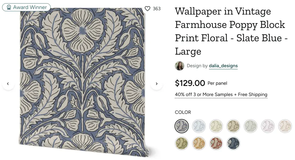 Vintage farmhouse wallpaper featuring a large poppy block print in slate blue, with intricate floral designs.