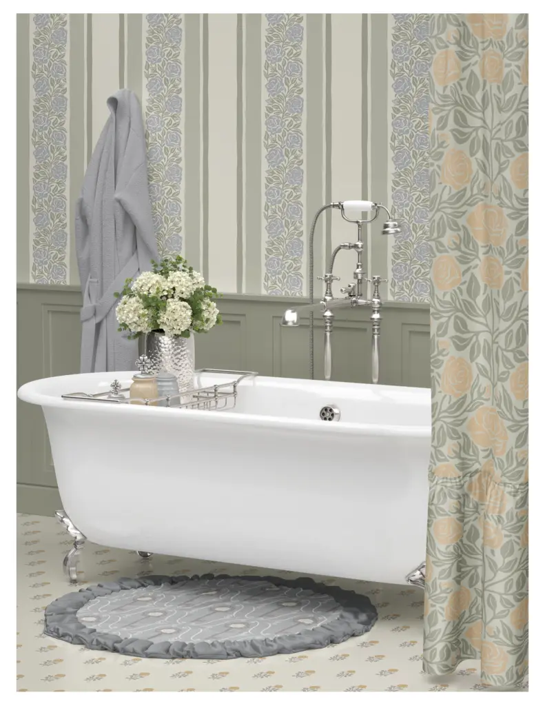 A vintage-inspired bathroom featuring a white freestanding bathtub, a floral shower curtain, a round gray bath mat, and a towel hanging on the wall. The walls are adorned with light-colored striped wallpaper, and a vase of white flowers is placed near the tub.