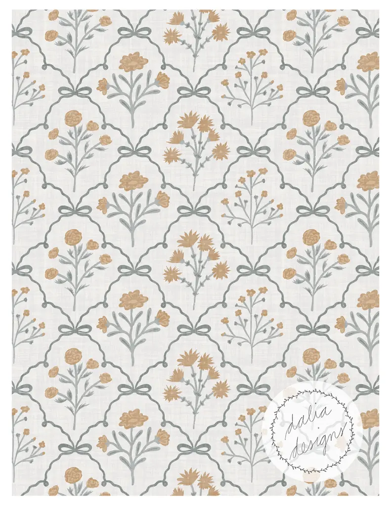 A floral pattern featuring various flowers in shades of gold and gray, set against a light textured background with a repeating geometric design. Includes the text 'dalia designs' in a circular logo at the bottom right.